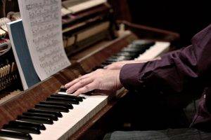 man playing piano